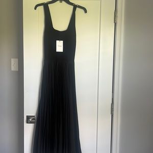 Beautiful long black sleeveless dress by Theory. Never worn!